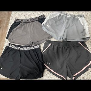4 pairs of women’s medium under armor shorts